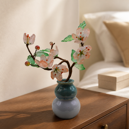 Blush glass peach blossom tree in a bedroom setting