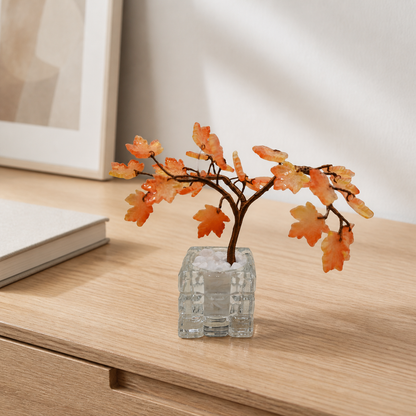 Amber glass maple tree displayed in an office