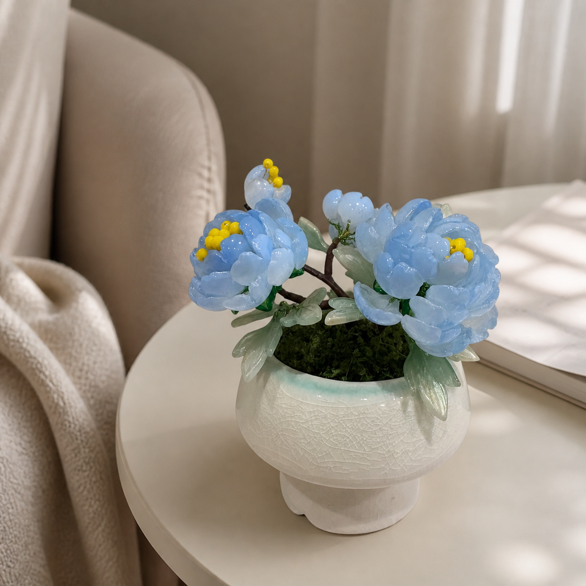 Side view of handmade sky blue glass peony arrangement