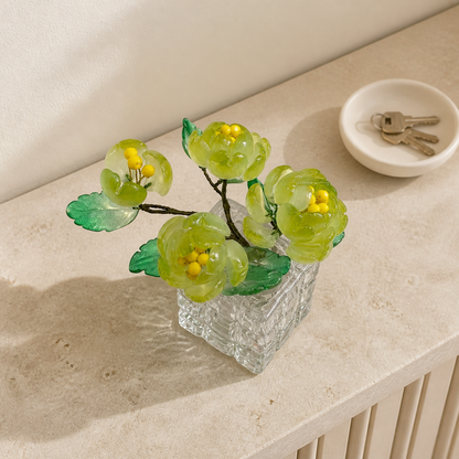 Side view of handmade spring green glass peony arrangement