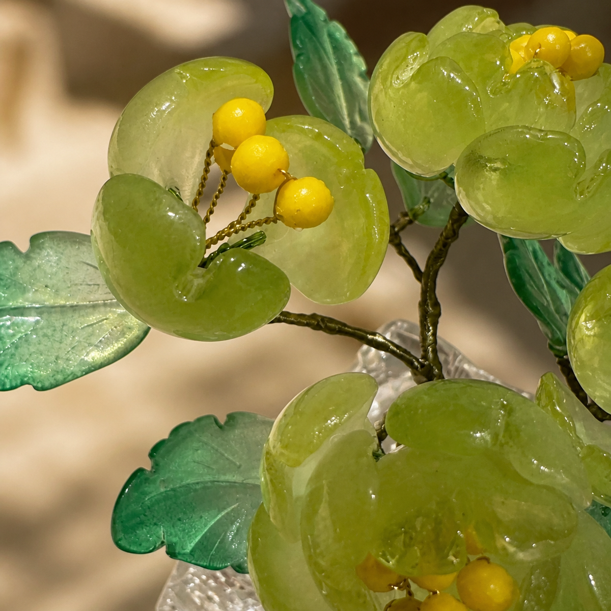 Close-up of green glass peony petals and leaves